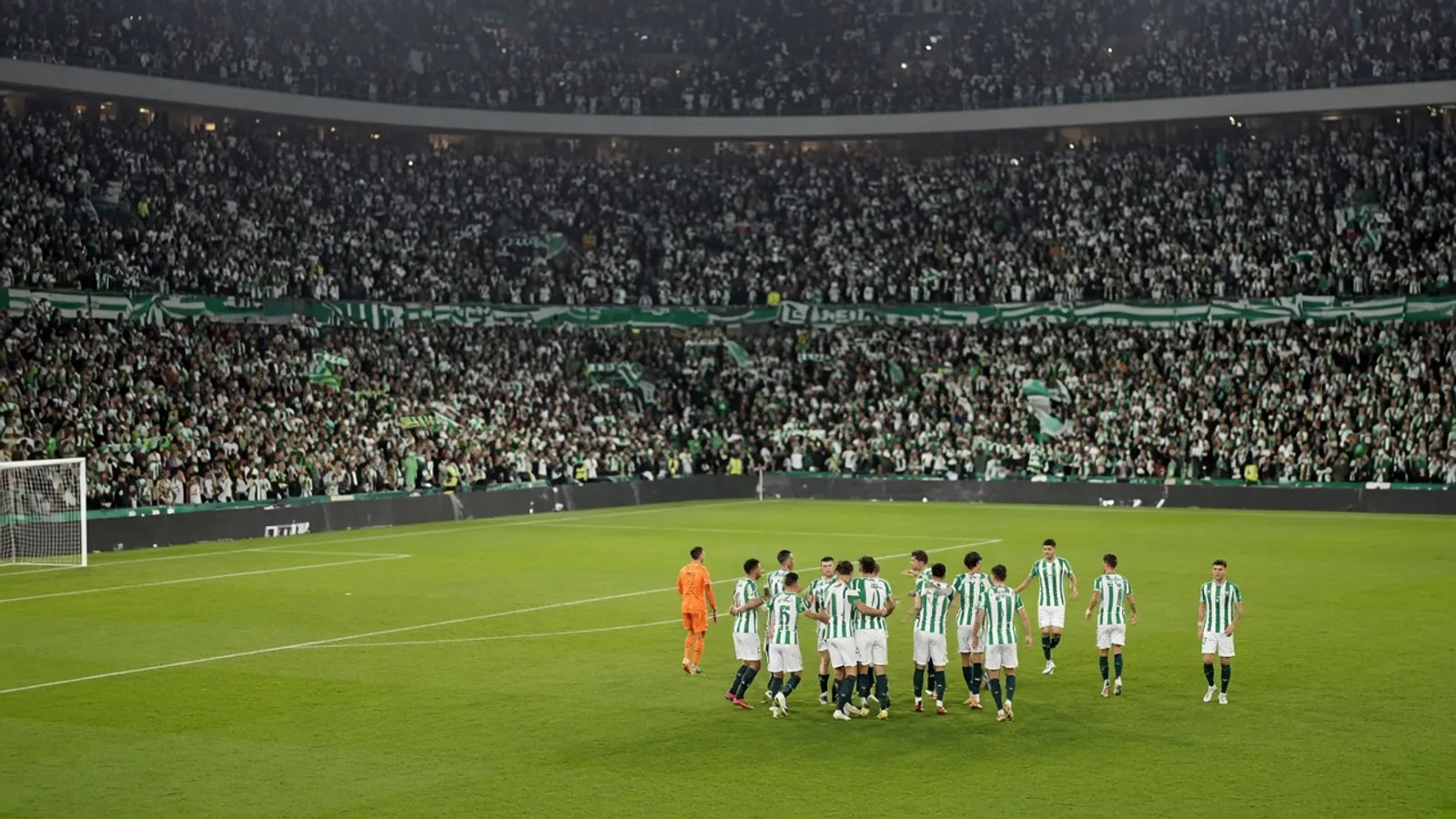 Afición verdiblanca celebrando en un estadio